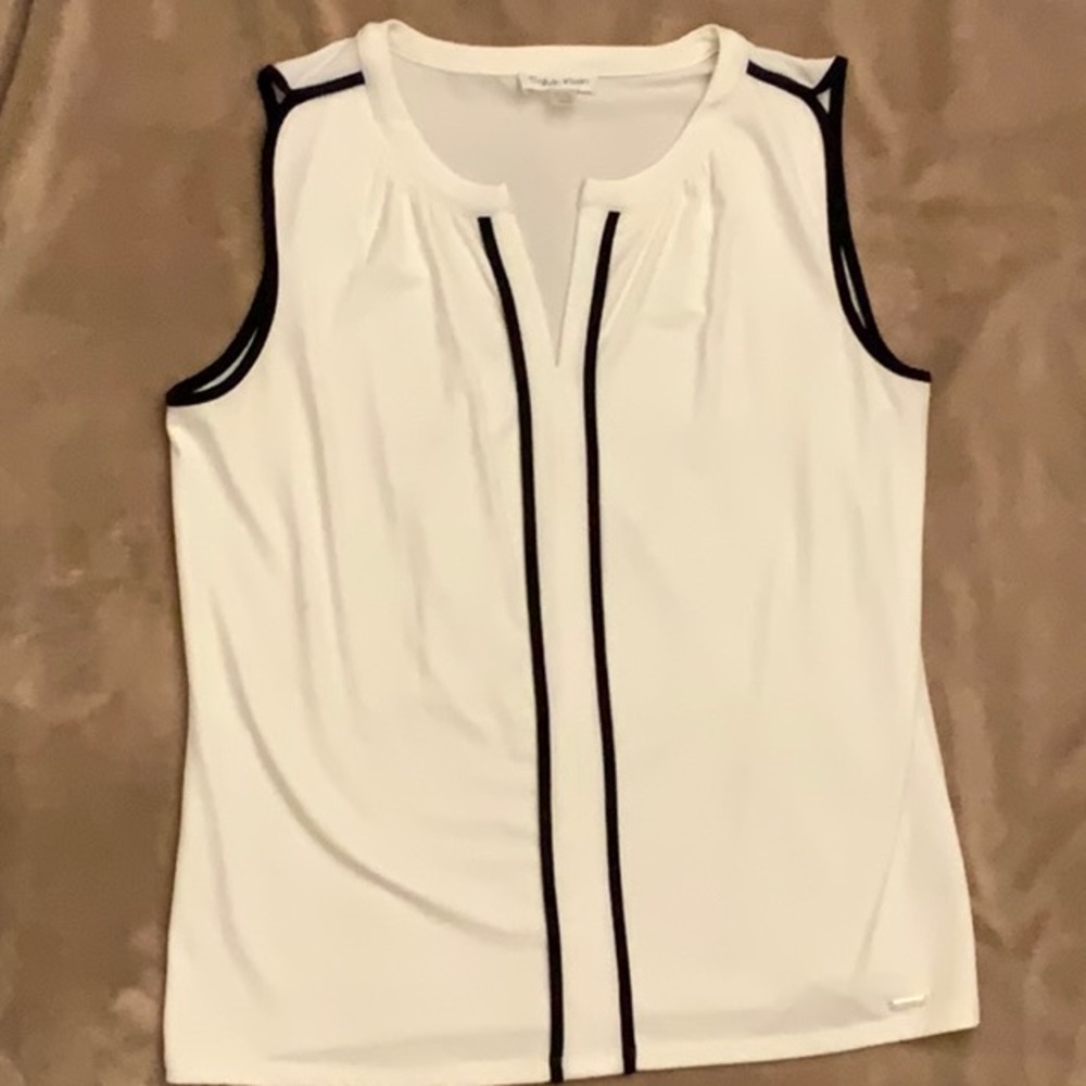 Black and White color Calvin Klein top. Size medium.